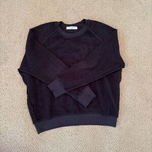 Black crewneck sweater